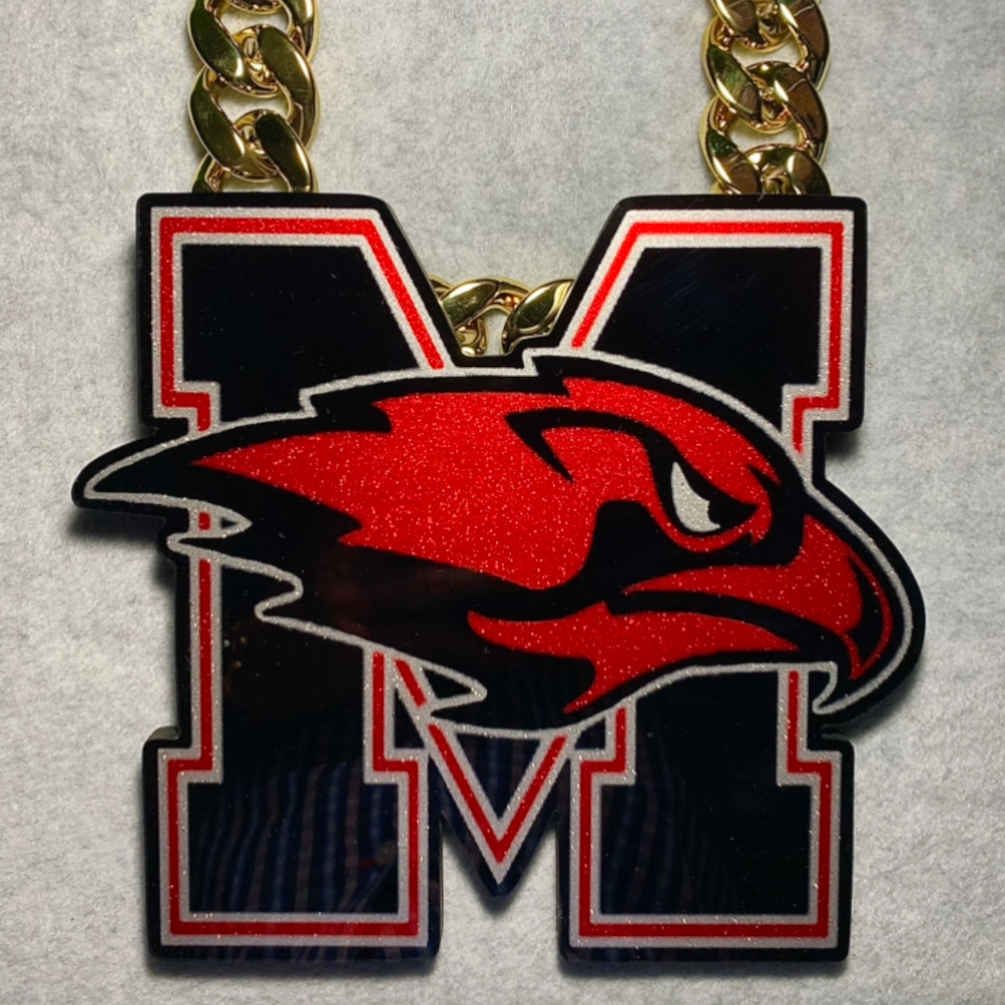Block M pendant with red hawk logo on top.