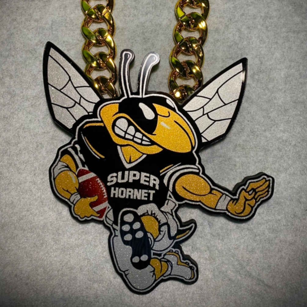 Super Hornet football mascot pendant on a gold chain.