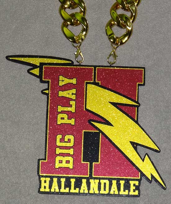 Big Play Hallandale H pendant with yellow lightning bolt.