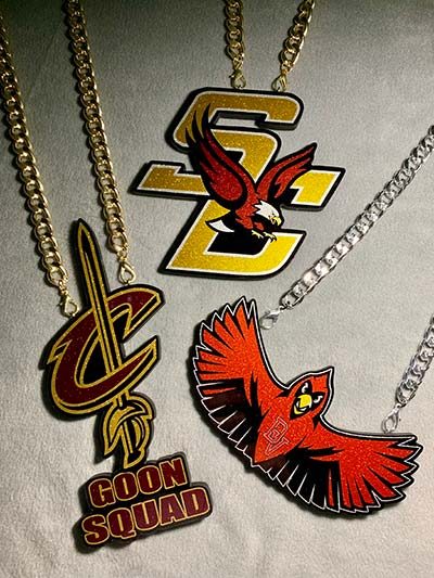 Three team pendants shown together in a medley layout.